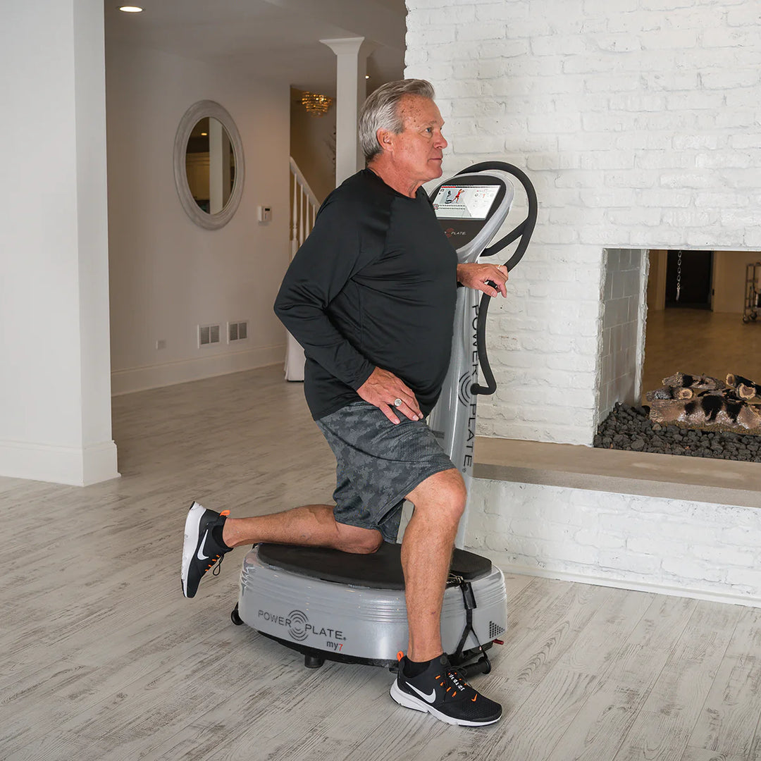 Man using Silver Power Plate® my7™ in a home setting